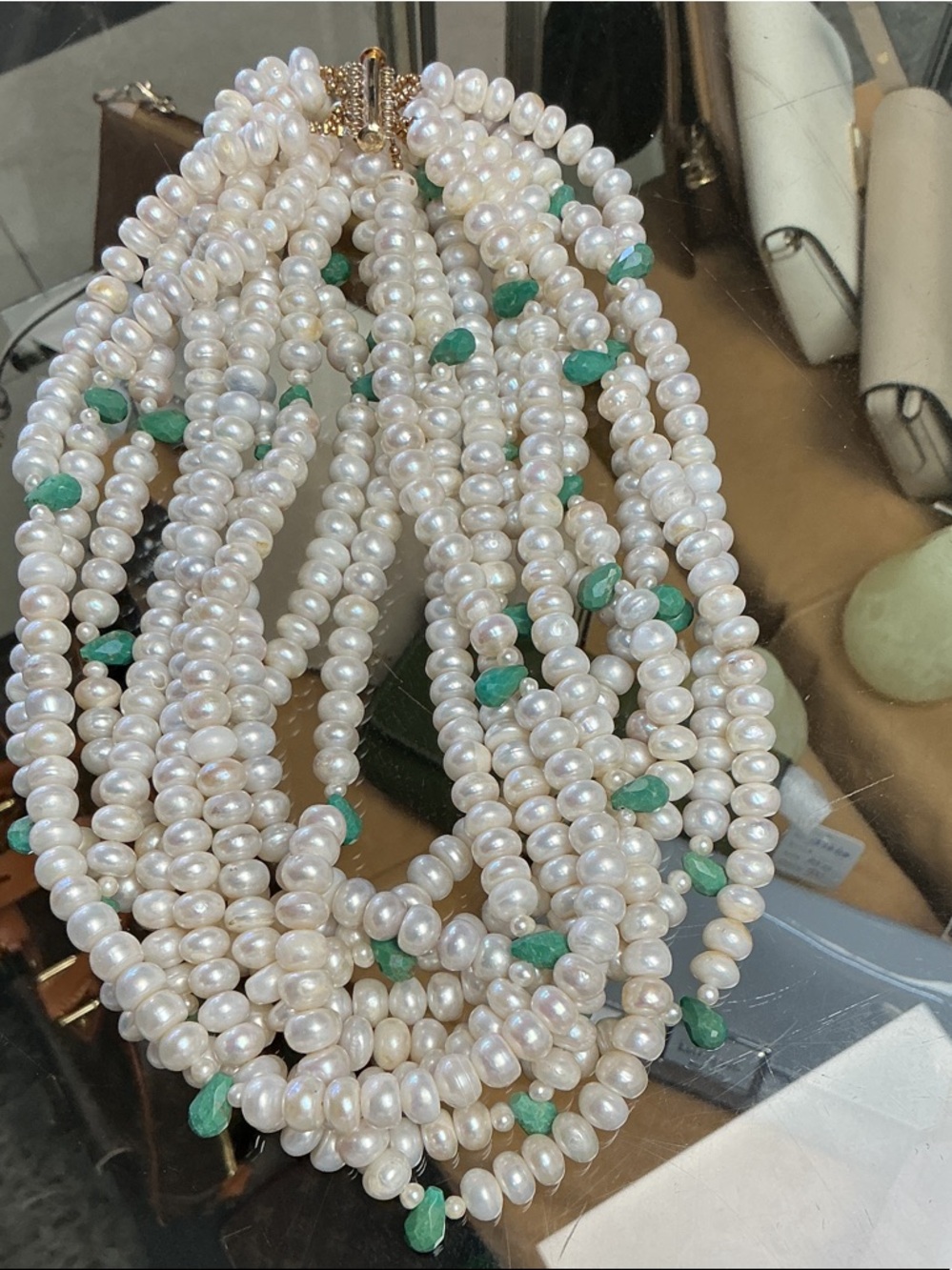 Multi-Strand White Pearl Necklace with Green Accents